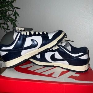Vintage navy dunks, 8.5 Woman, open to any offers.
